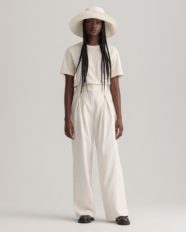 Kritstrecksrandiga byxor med vida ben och veck