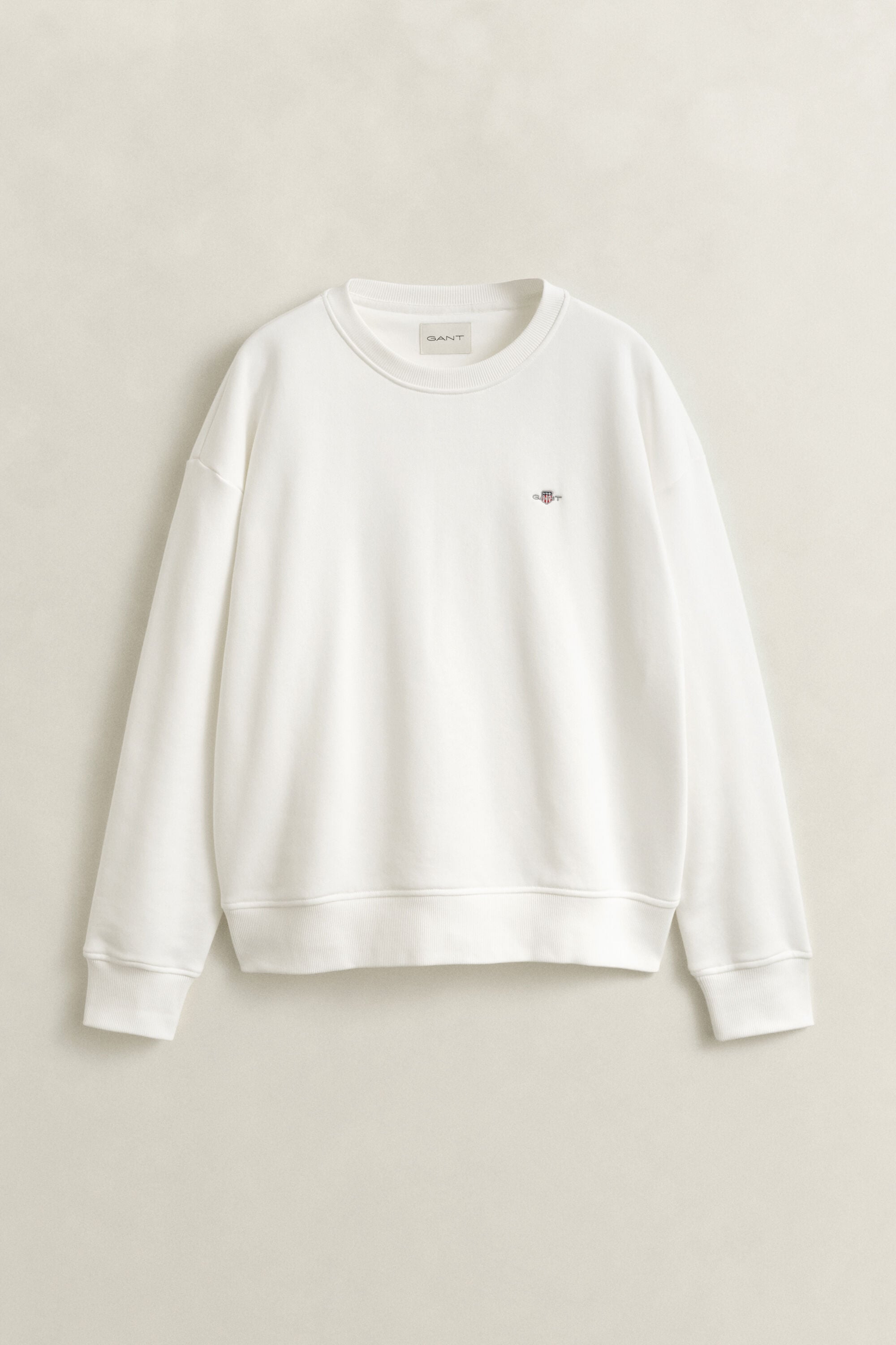 Sweatshirt med sköldemblem