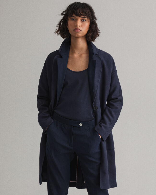 Fluid kappa i linneblandning med b&auml;lte