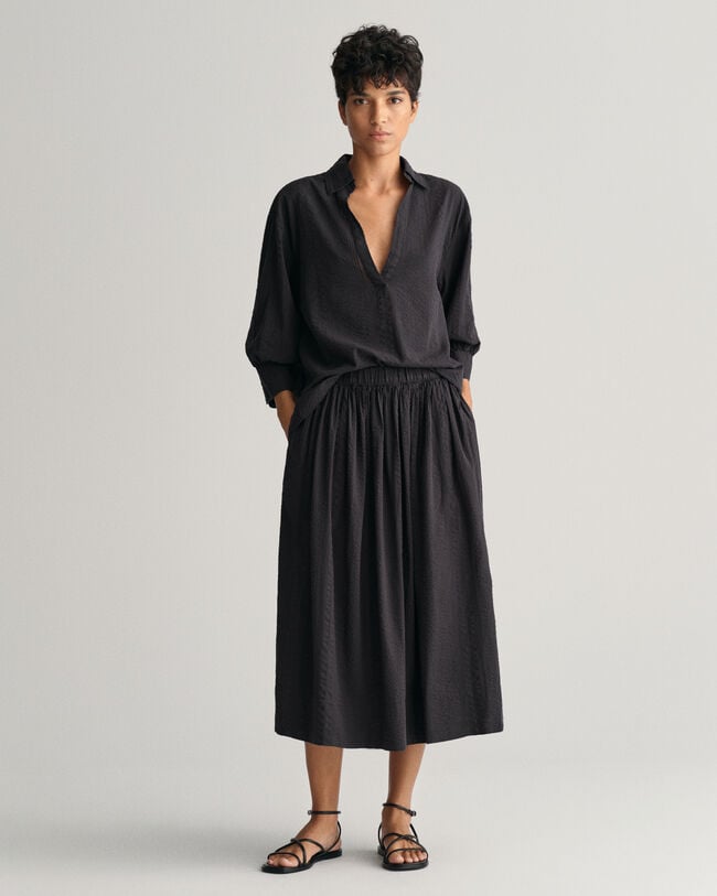 Randig dra-på-kjol i bäckebölja