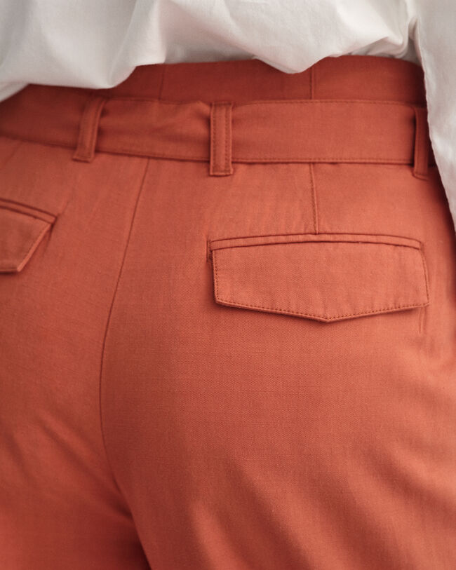 Cropped byxor med b&auml;lte och vida ben