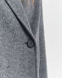 Handsydd jacka med bälte