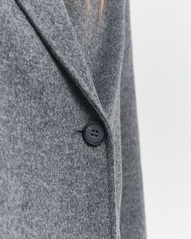 Handsydd jacka med bälte