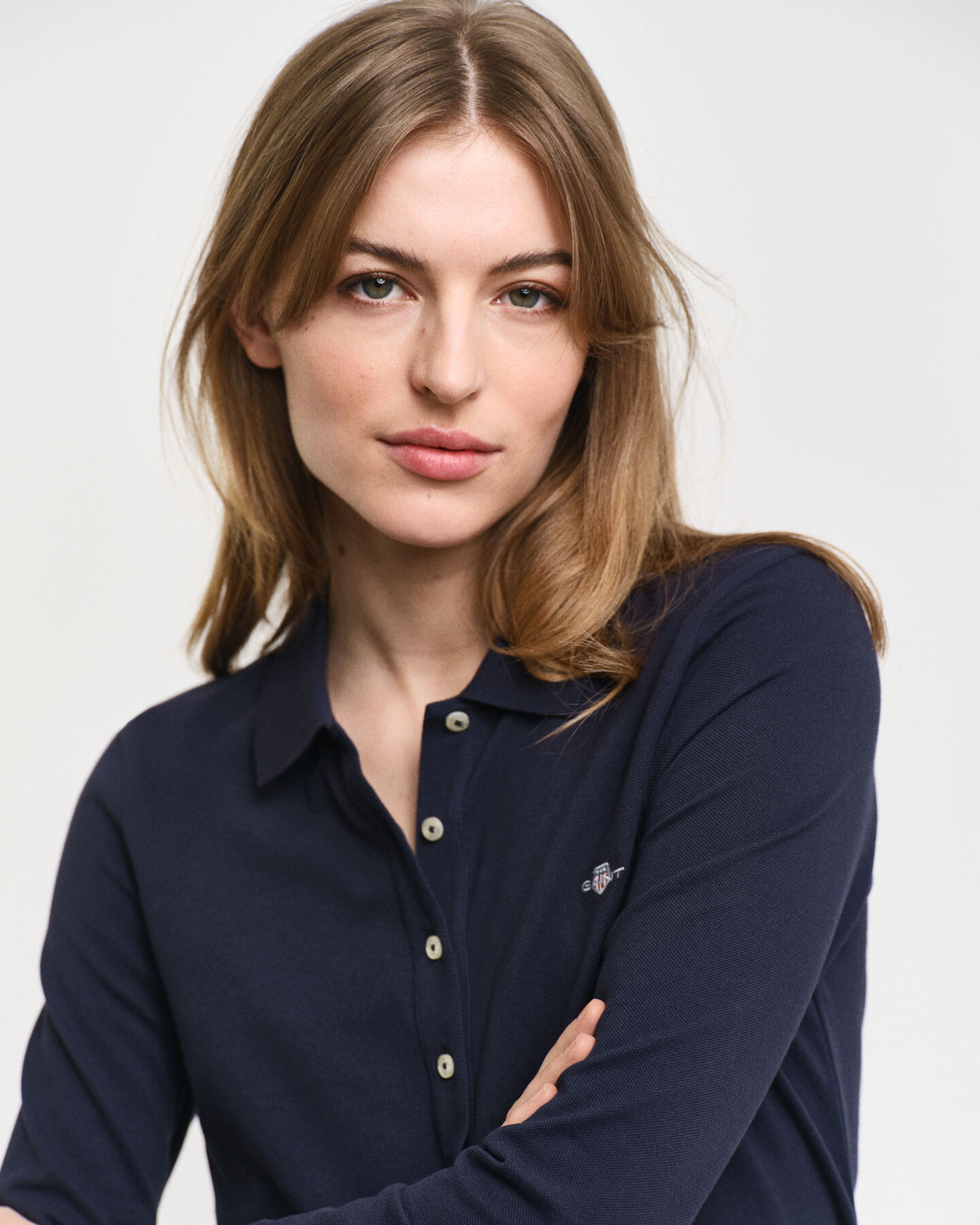 Långärmad pikétröja med sköld