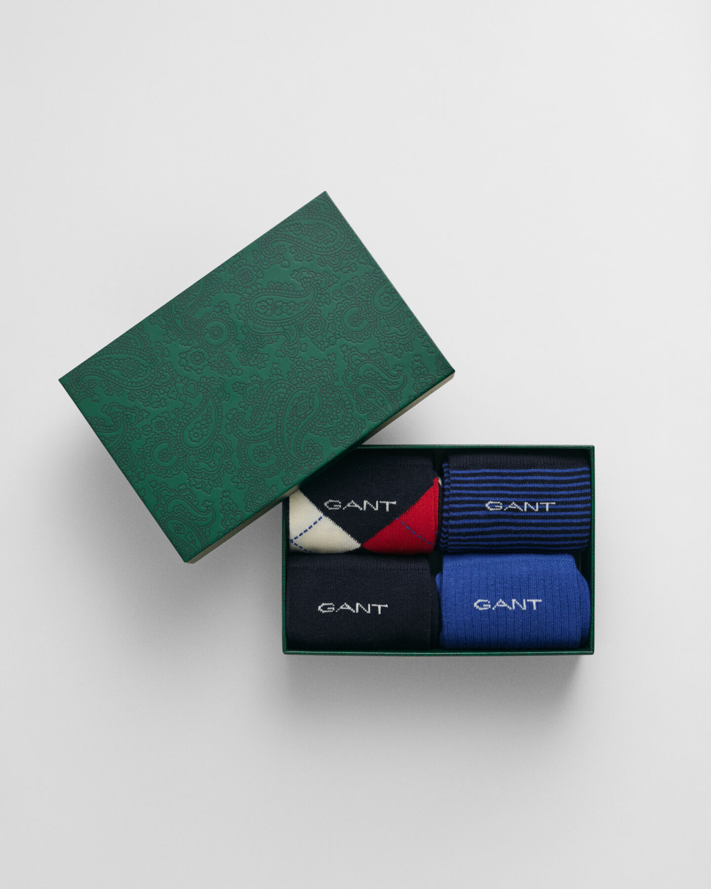 Fyrpack argylem&ouml;nstrade strumpor i presentf&ouml;rpackning