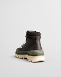 Nebrada mellanhöga boots i skinn