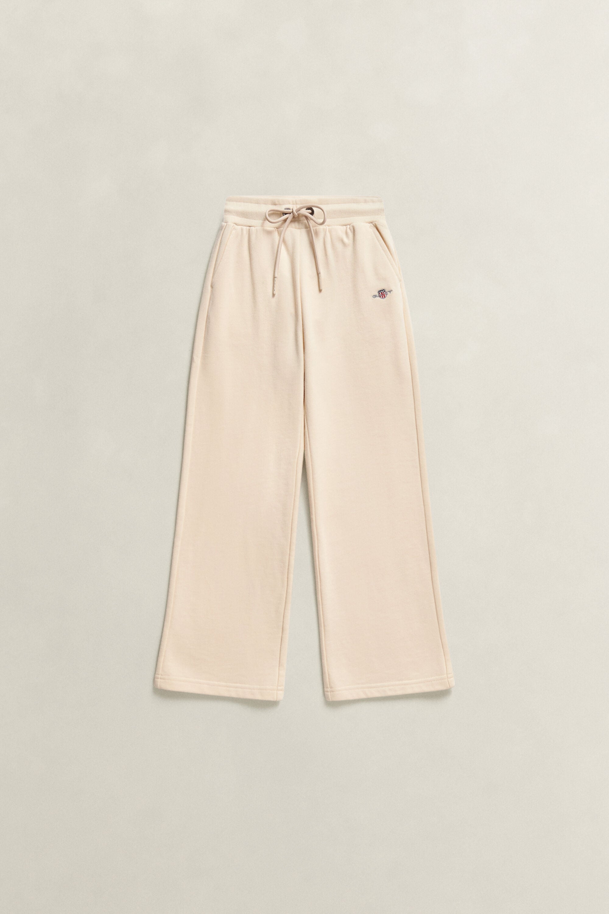 Girls sweatpants med sköldemblem