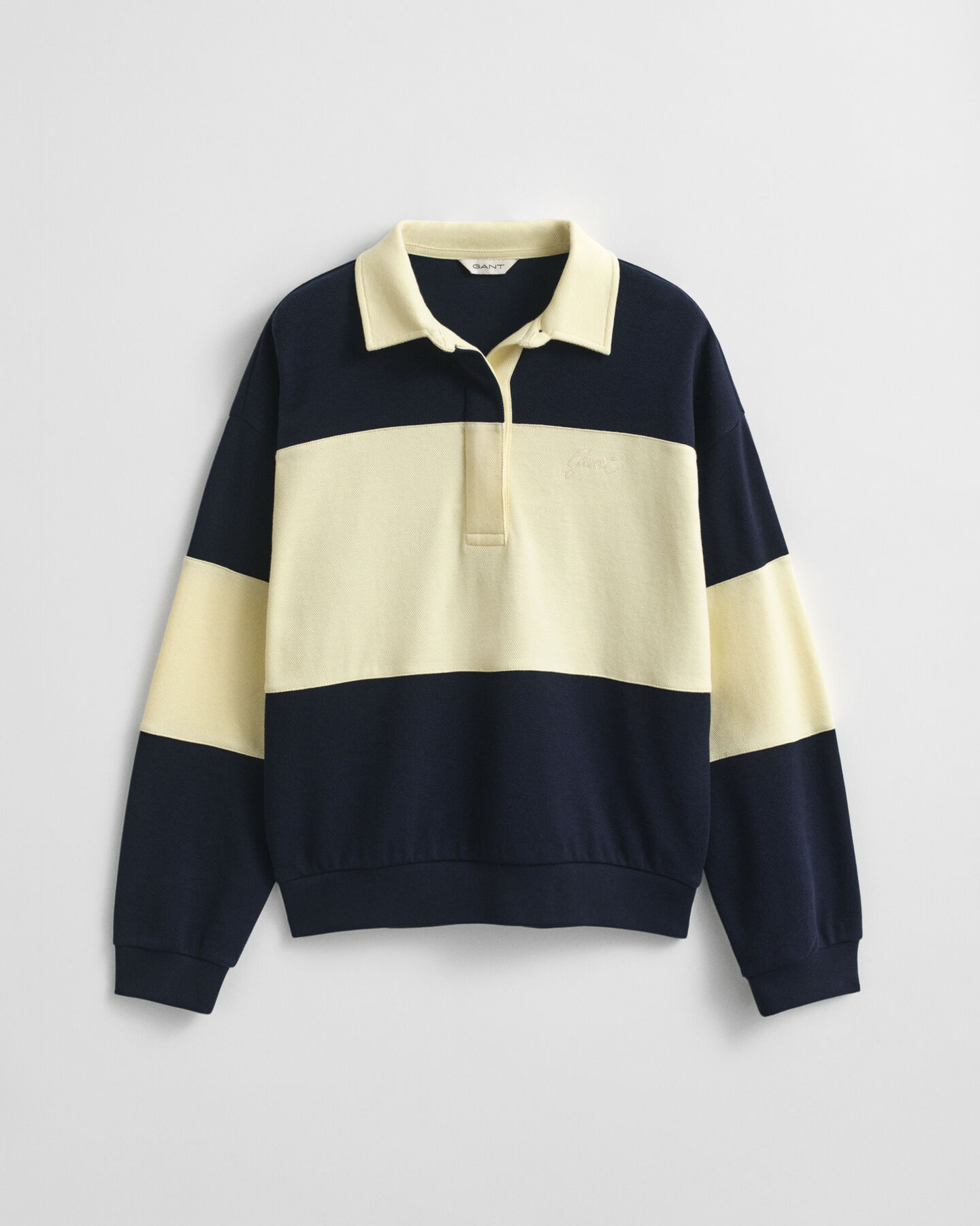 Rugger i pikéstruktur med färgblock