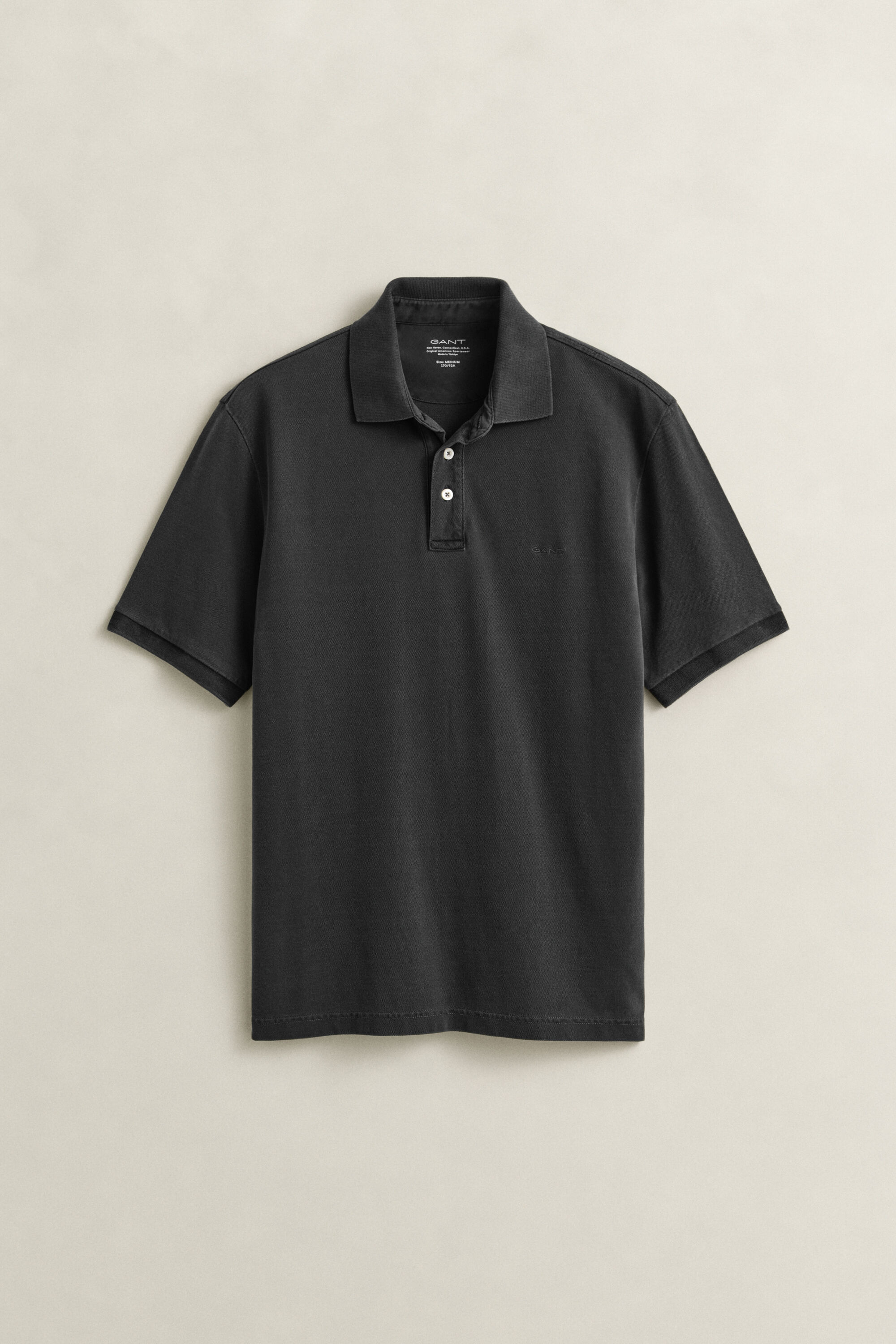 Sunfaded pikétröja