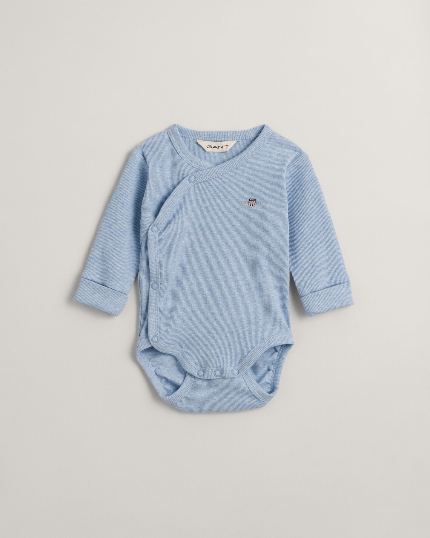 Baby Shield ribbstickad omlottbody