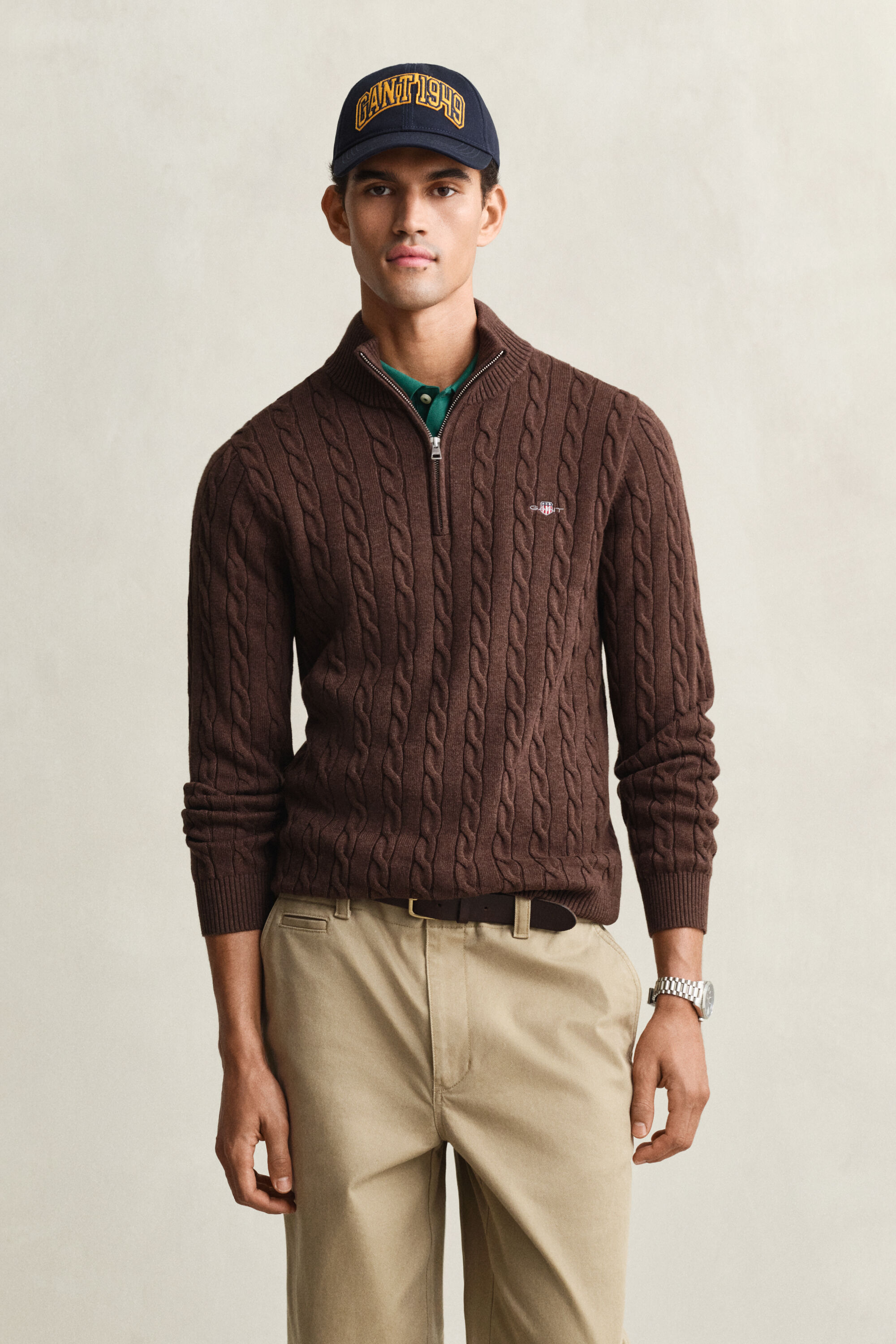 Kabelstickad bomullströja med dragkedja vid halsöppningen