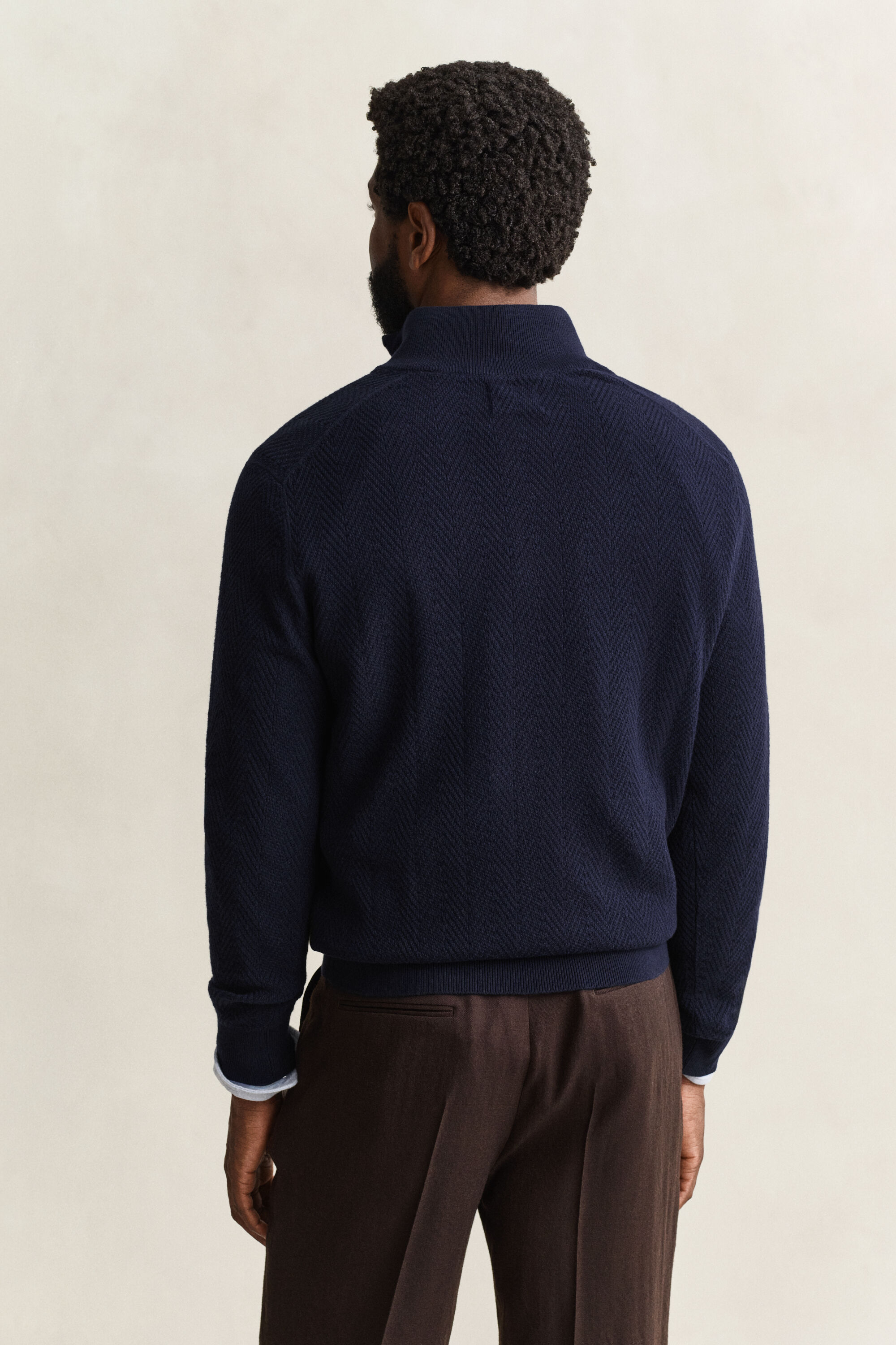 Fiskbensmönstrad half-zip tröja