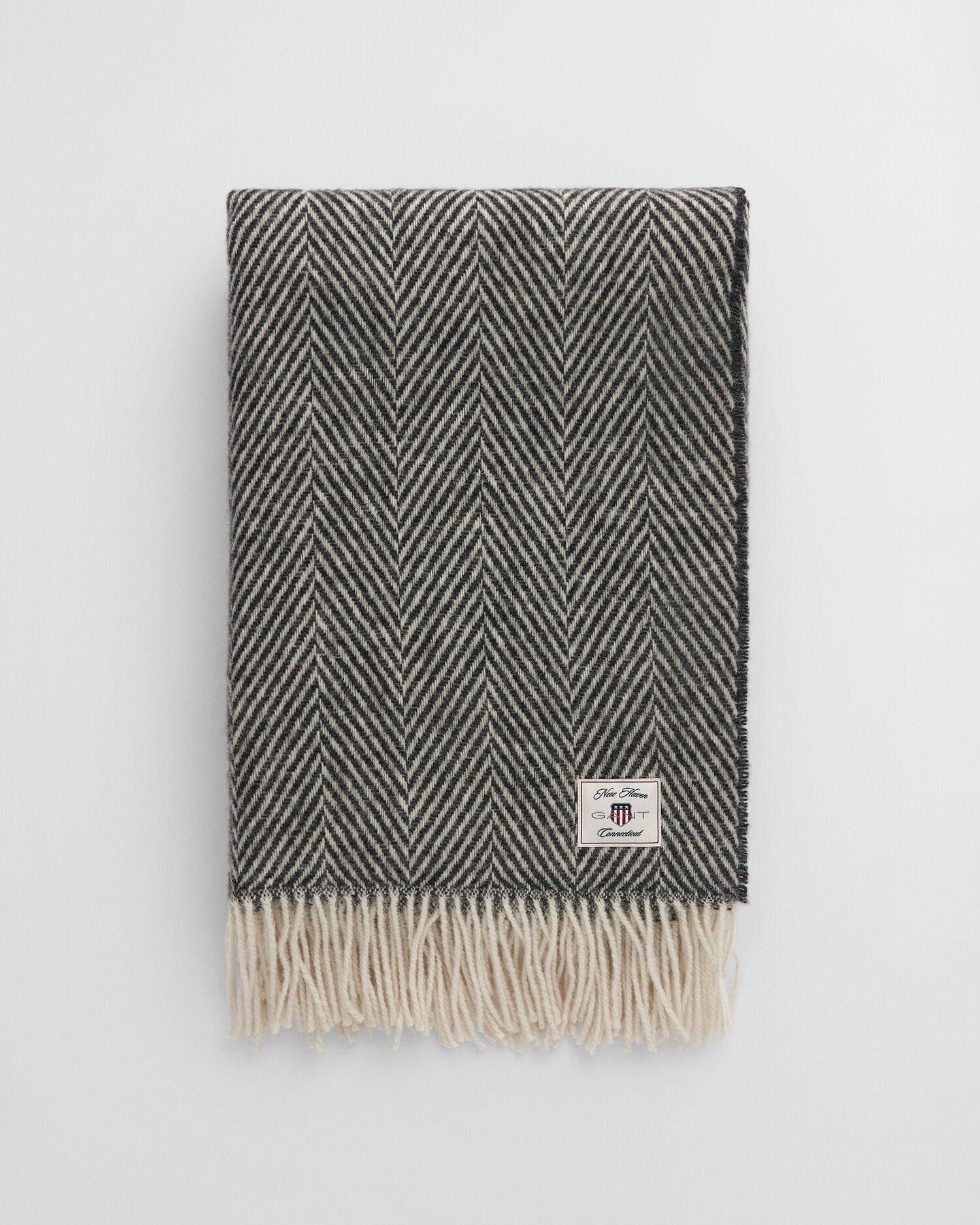 Fiskbensmönstrad yllepläd