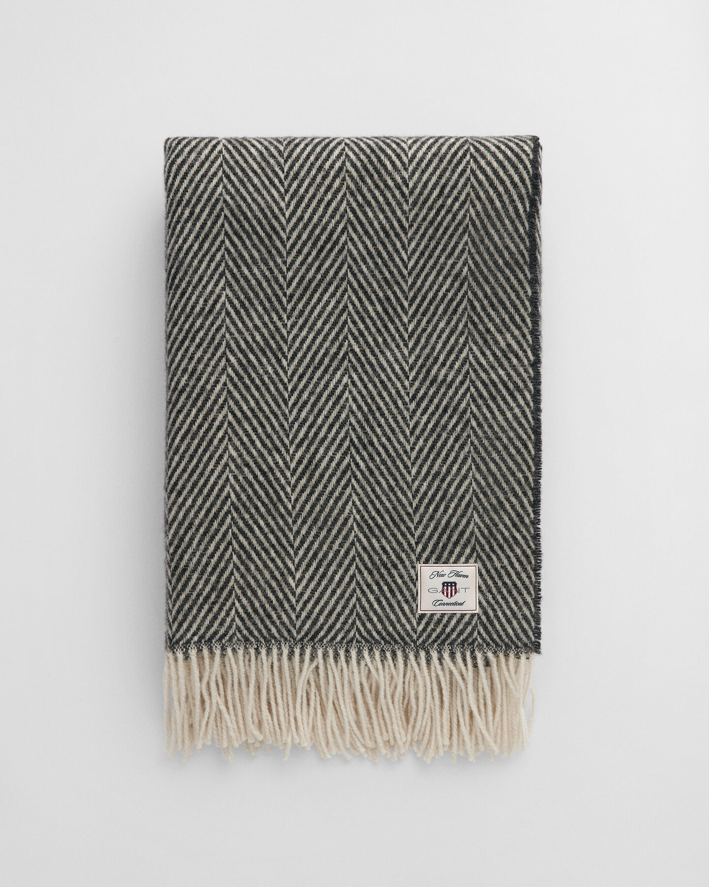 Fiskbensmönstrad yllepläd