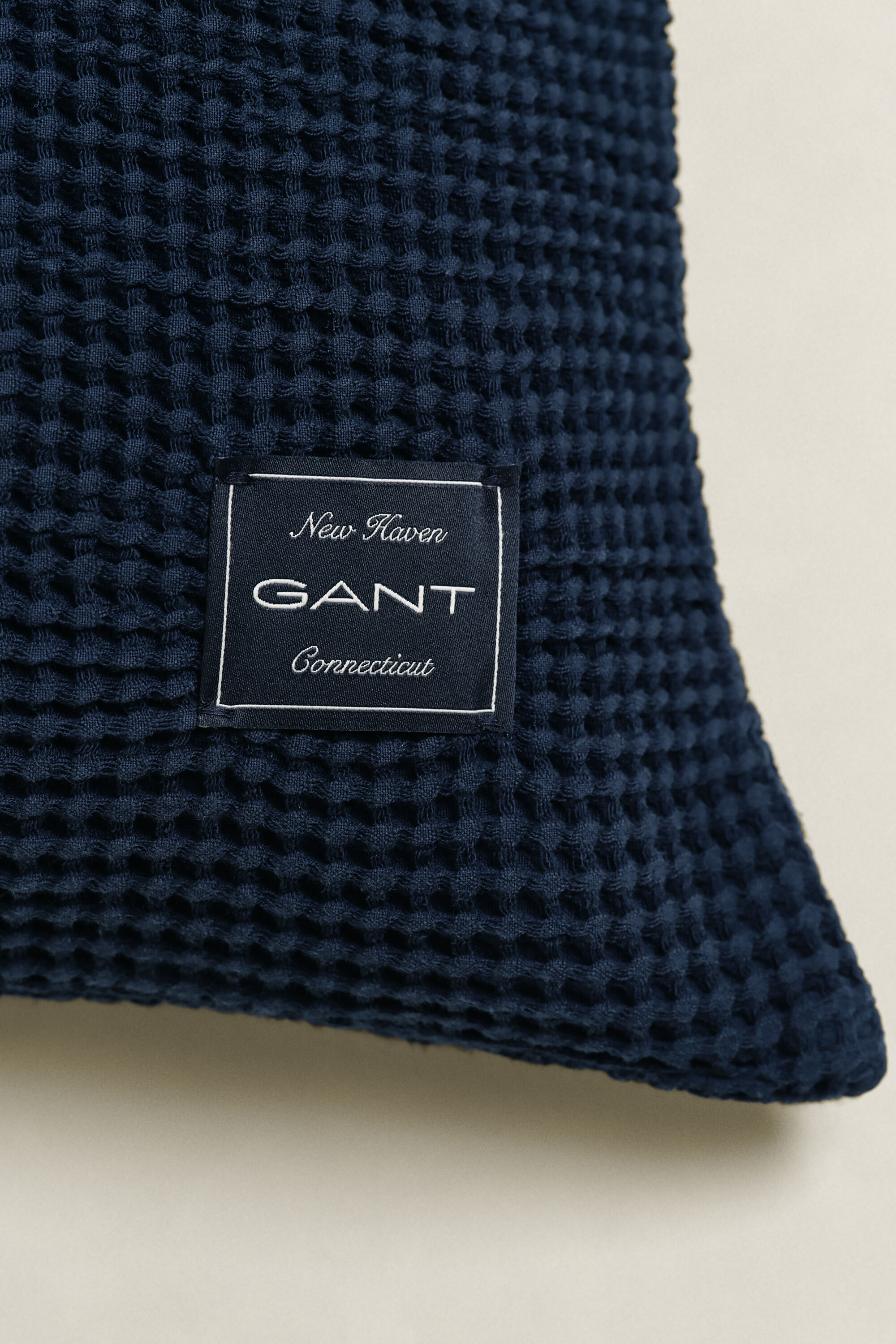 Kuddfodral i bomull med våffelstruktur