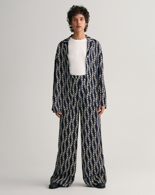 Chain Print byxor med vida ben