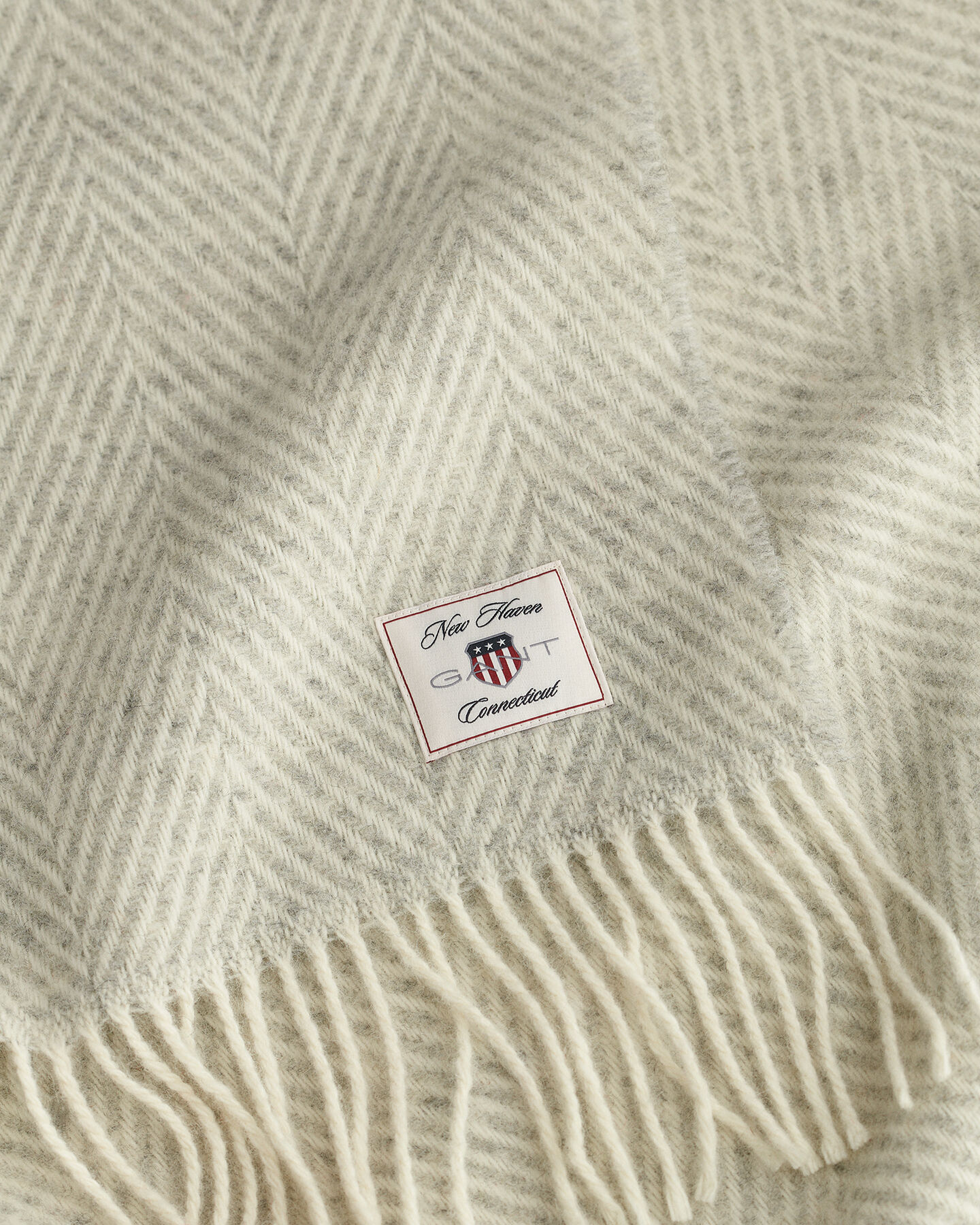 Fiskbensmönstrad yllepläd