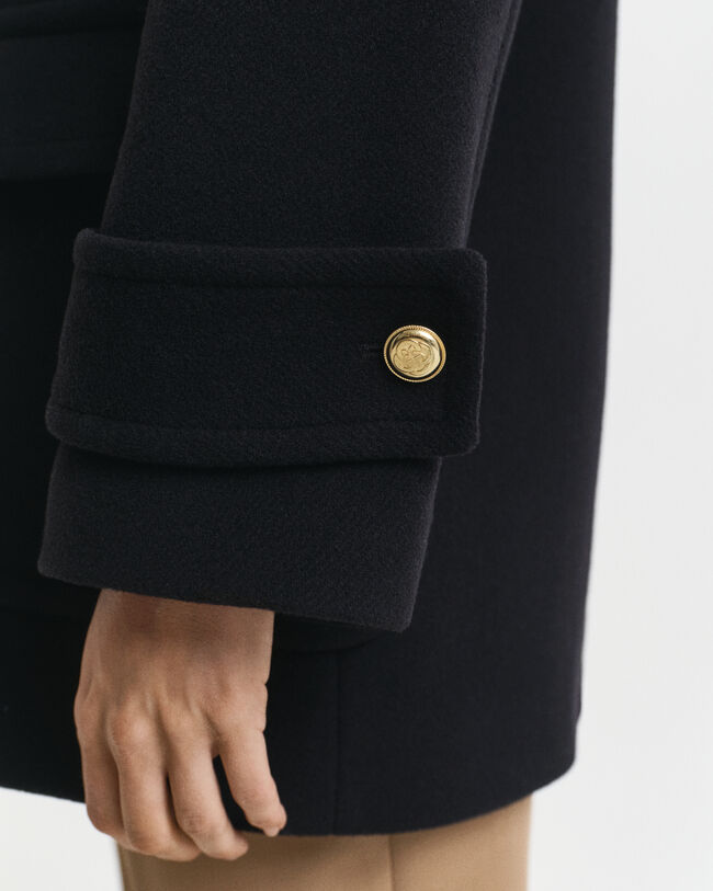 Medellång skepparkavaj i ylle