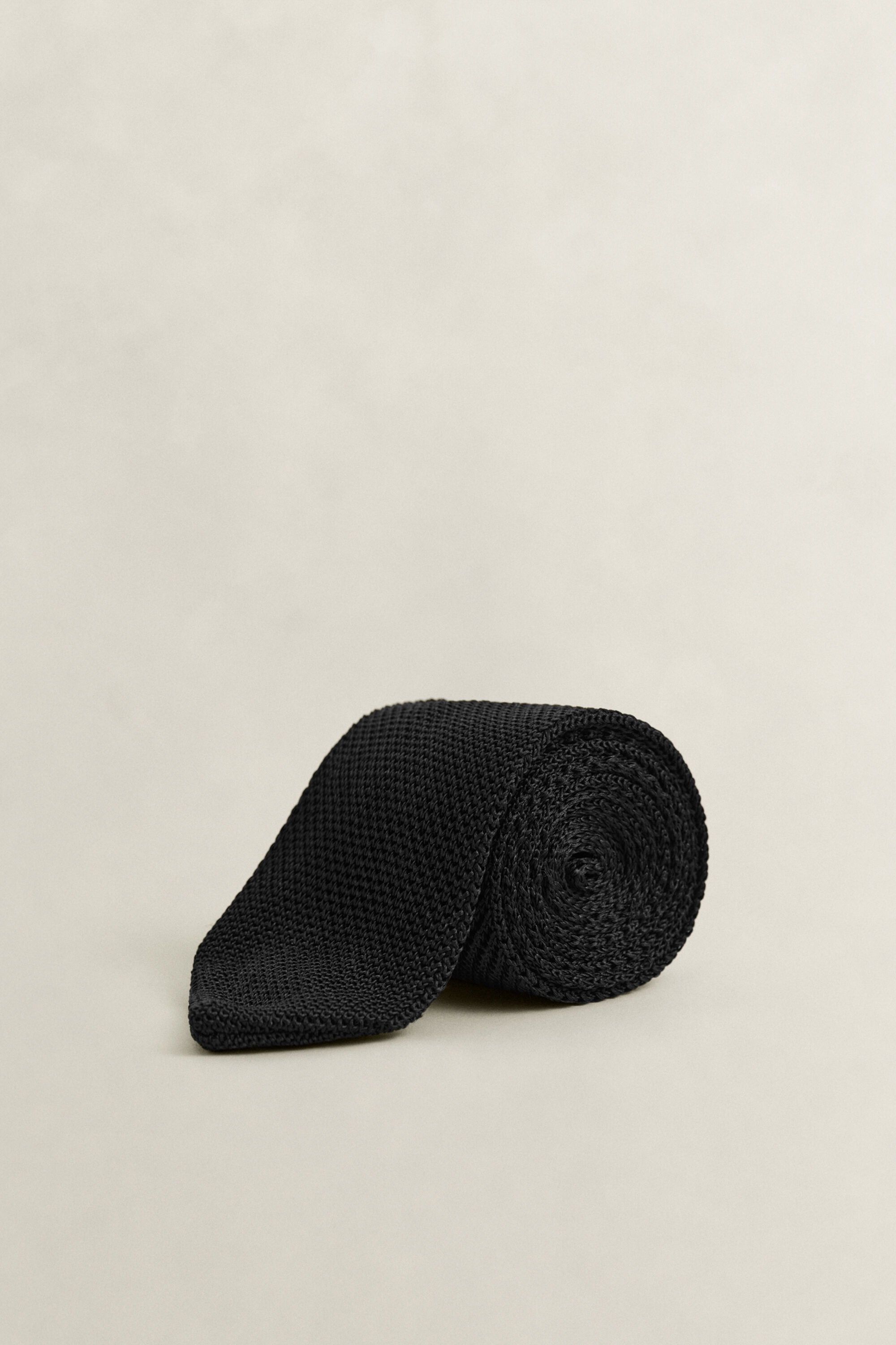 Stickad sidenslips