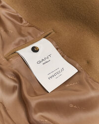 Medellång skepparkavaj i ylle