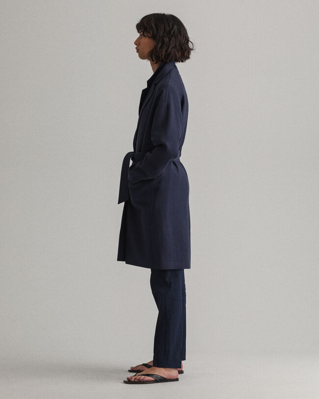 Fluid kappa i linneblandning med b&auml;lte