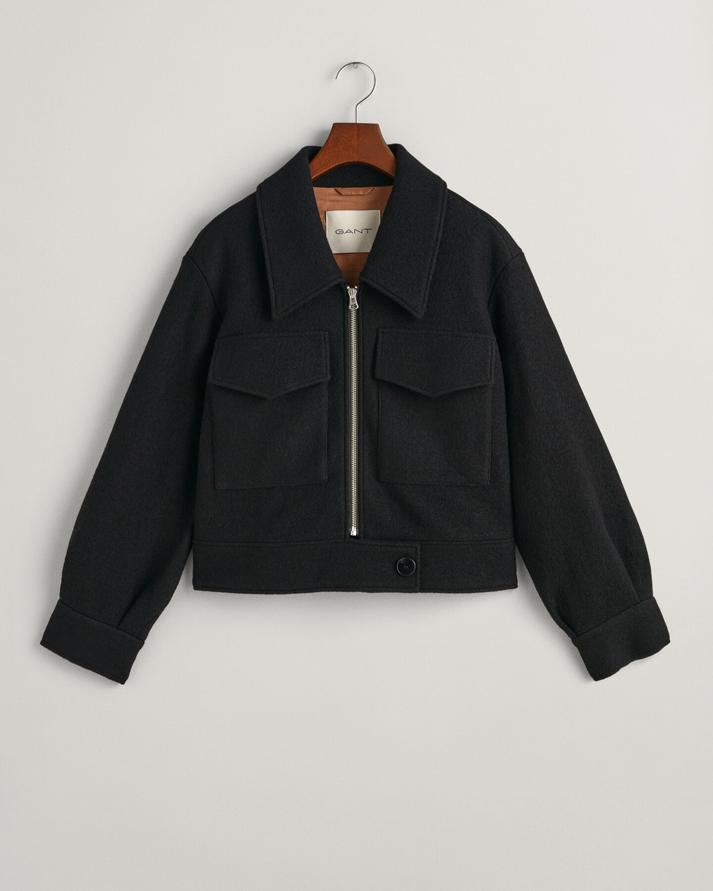 Jacka i boucl&eacute; med dragkedja