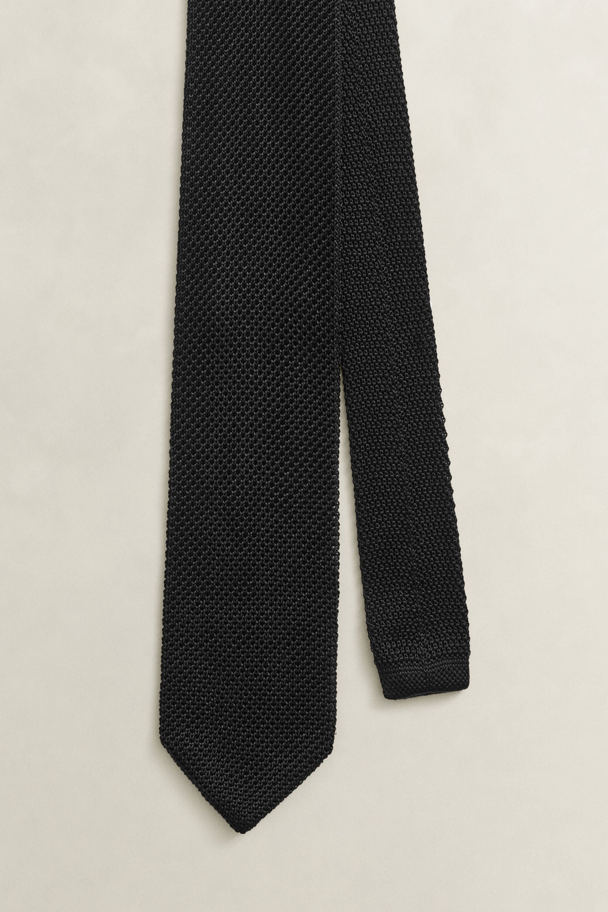 Stickad sidenslips