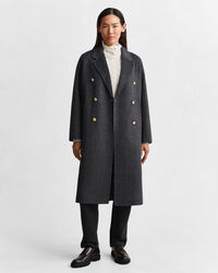 Rutig kappa med handsydda detaljer