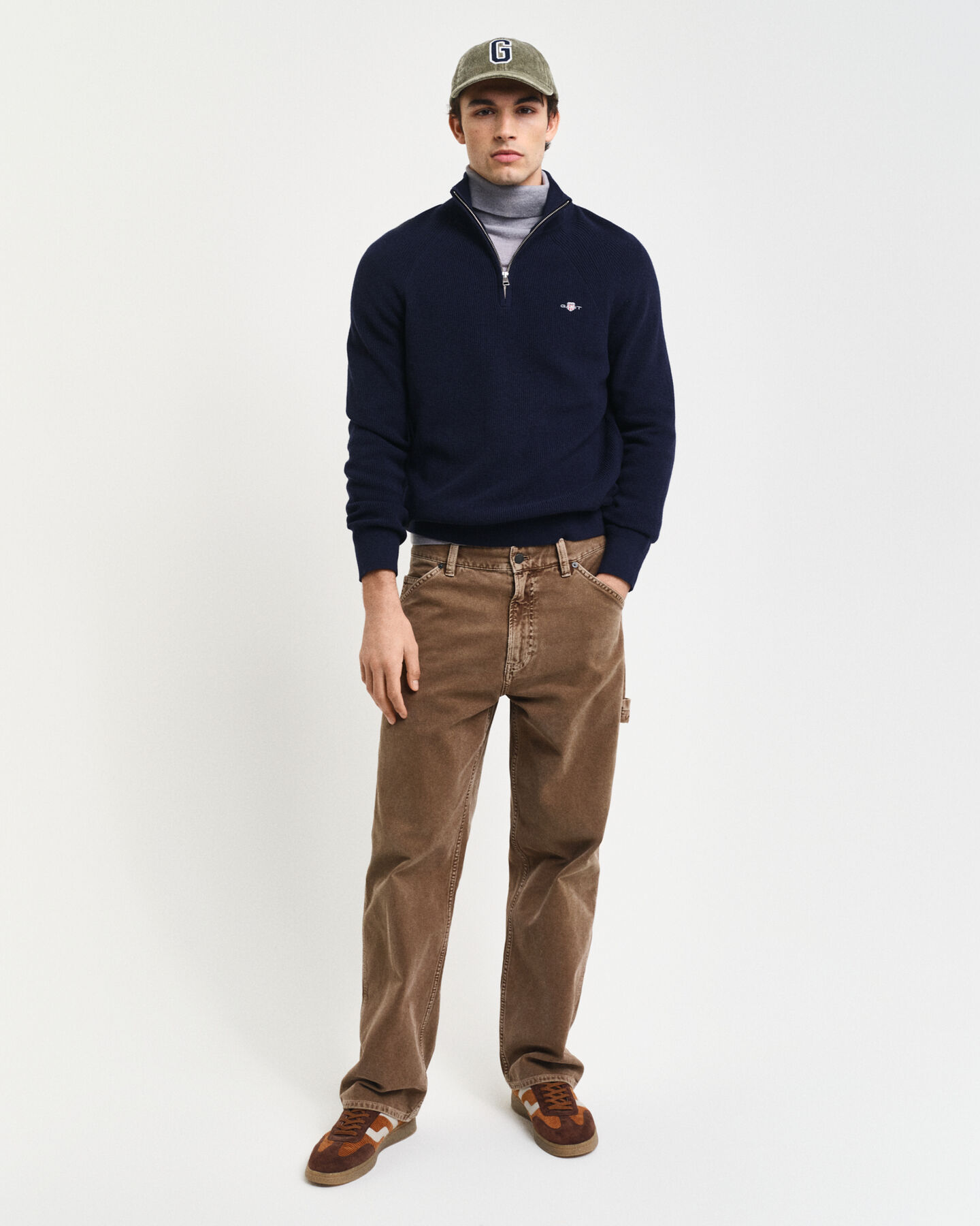 Ribbstickad tr&ouml;ja i bomull och ull med halv dragkedja