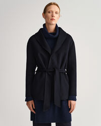 Handsydd kavaj med bälte