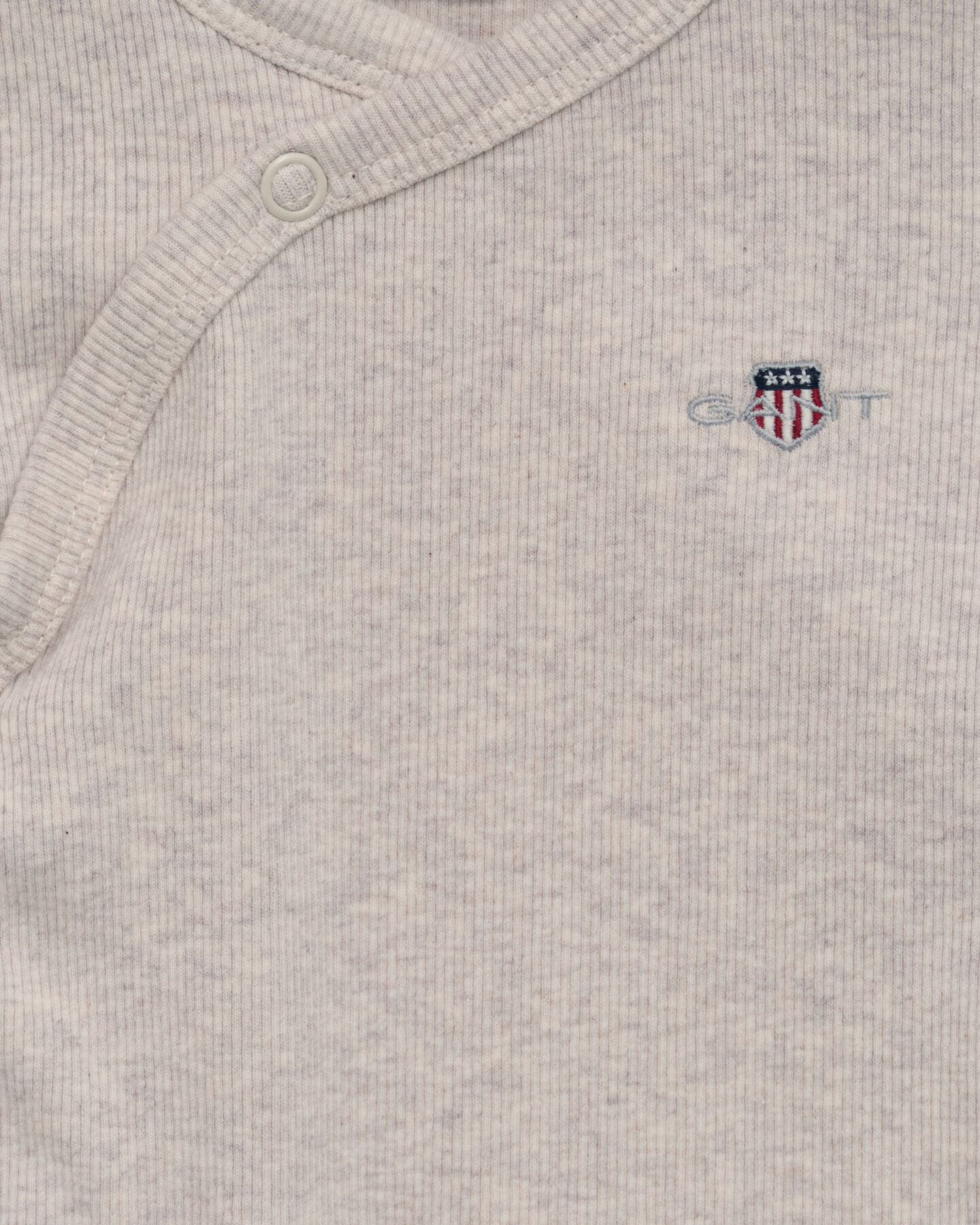 Baby Shield ribbstickad omlottbody