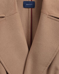 Kappa i ullblandning med bälte