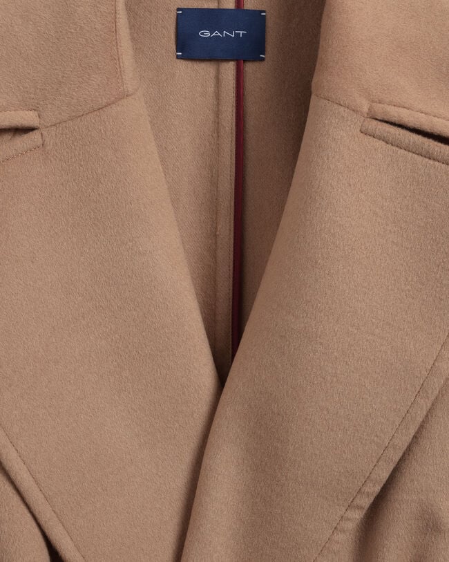 Kappa i ullblandning med bälte