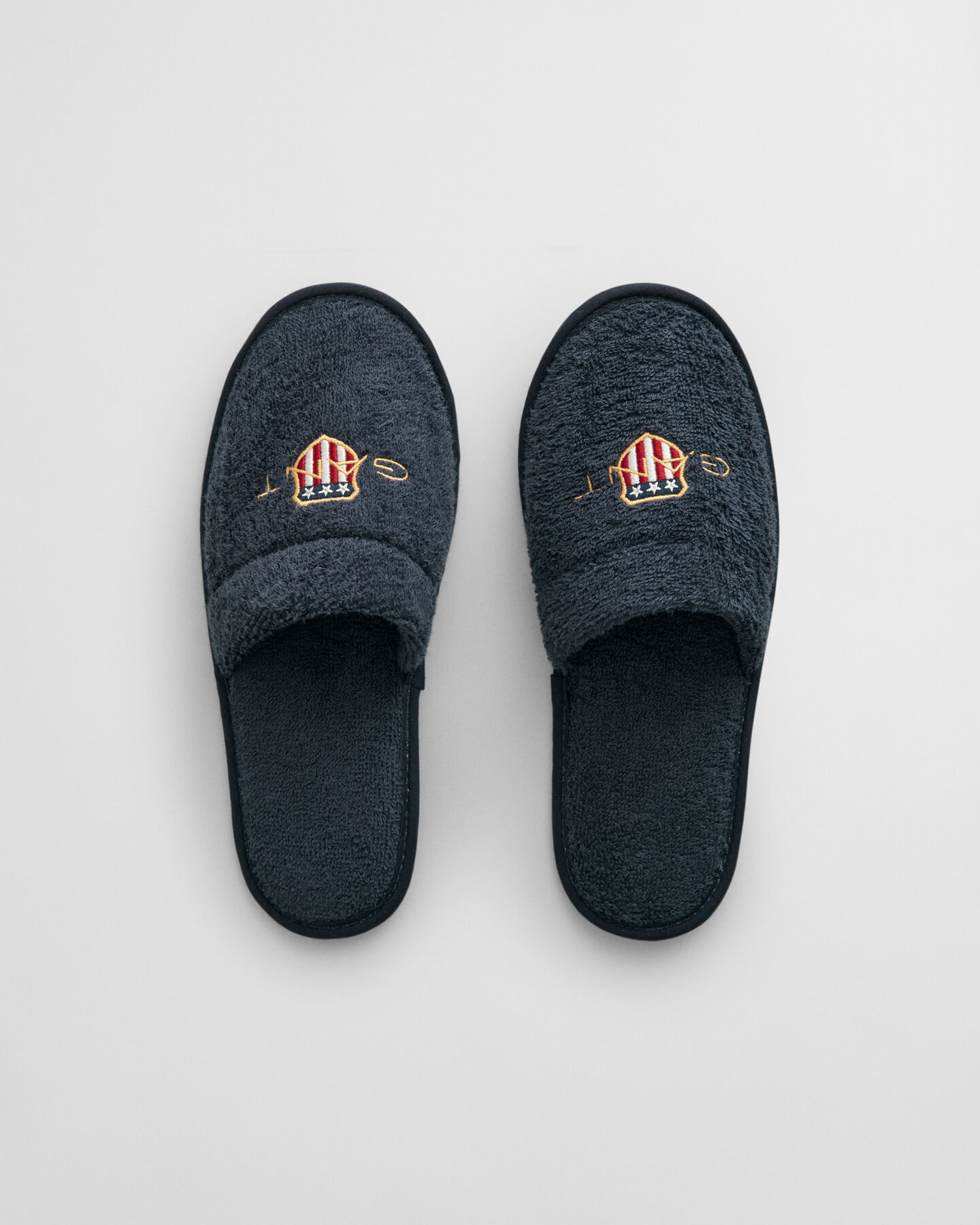 Archive Shield tofflor i frotté