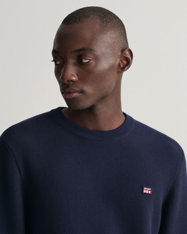 Tunnstickad crew neck tröja