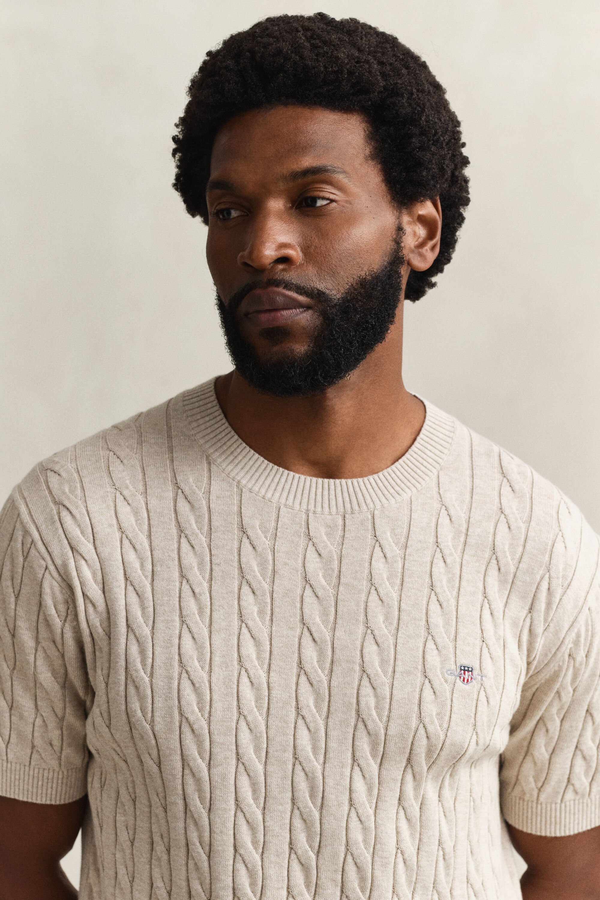 Kortärmad kabelstickad bomullströja