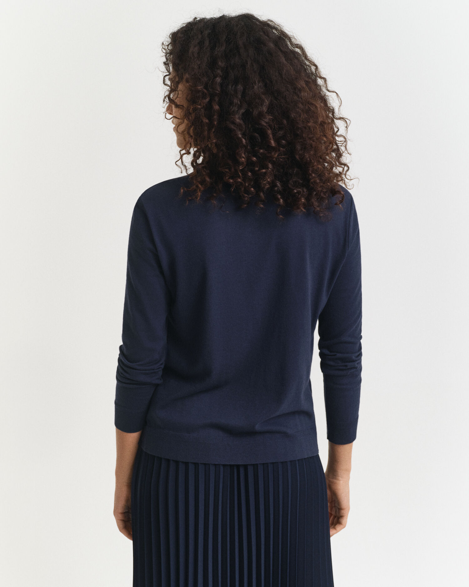 Långärmad sömlös pikétröja med knappar