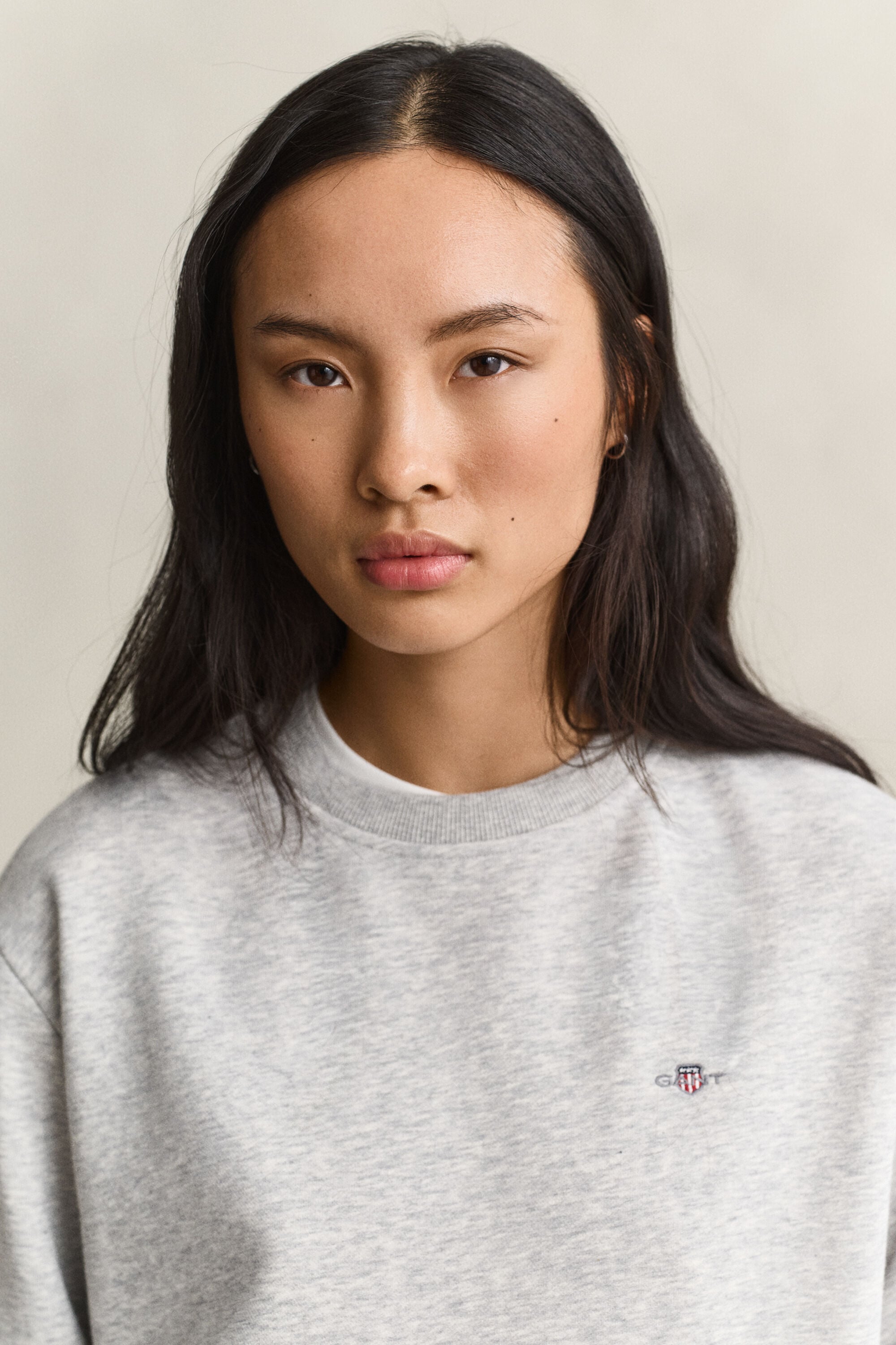 Sweatshirt med sköldemblem