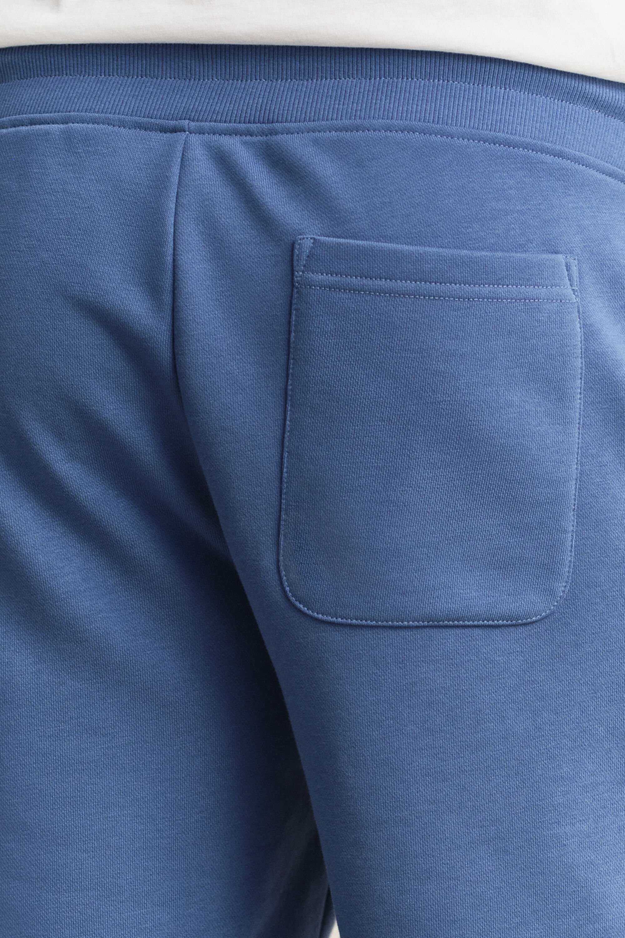 Sweatshorts med sköldemblem