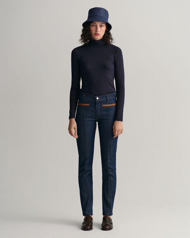 Slim fit jeans med skinndetaljer