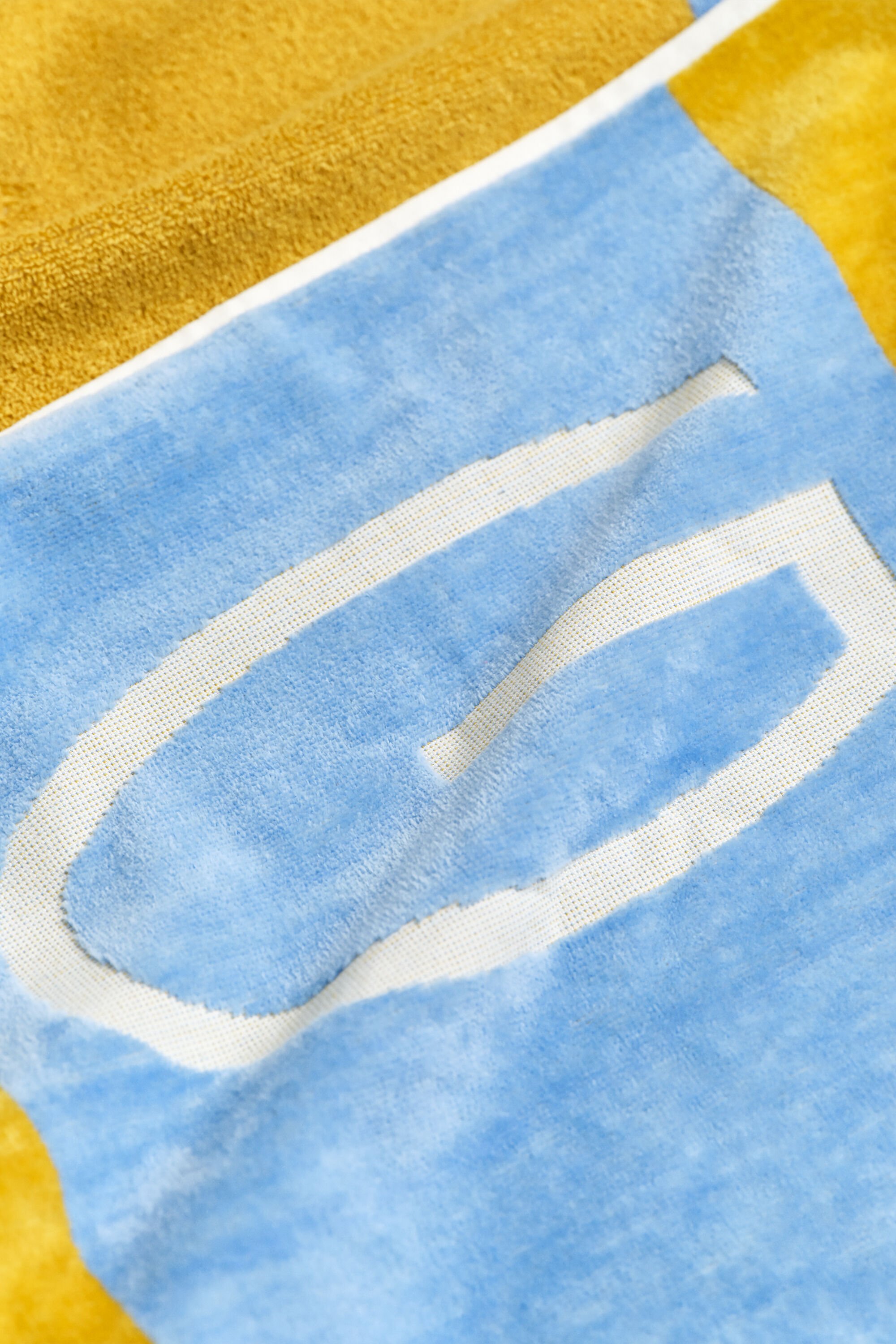 Strandhandduk med blockränder