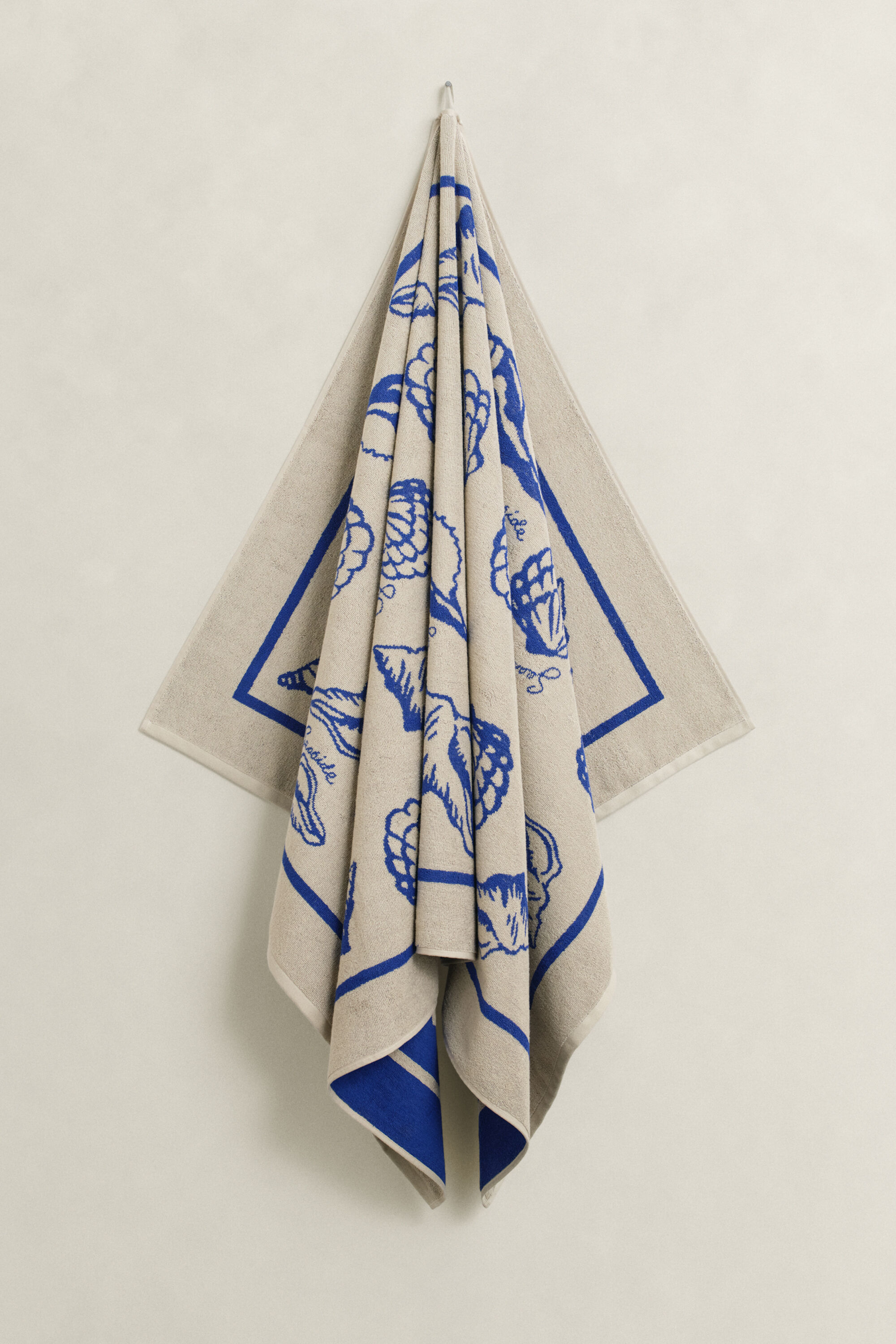 Snäckmönstrad strandhandduk