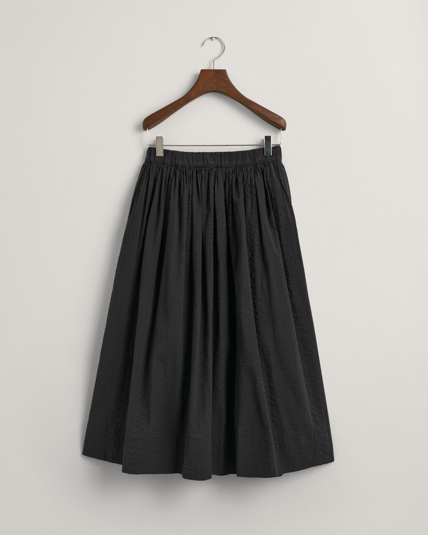 Randig dra-på-kjol i bäckebölja