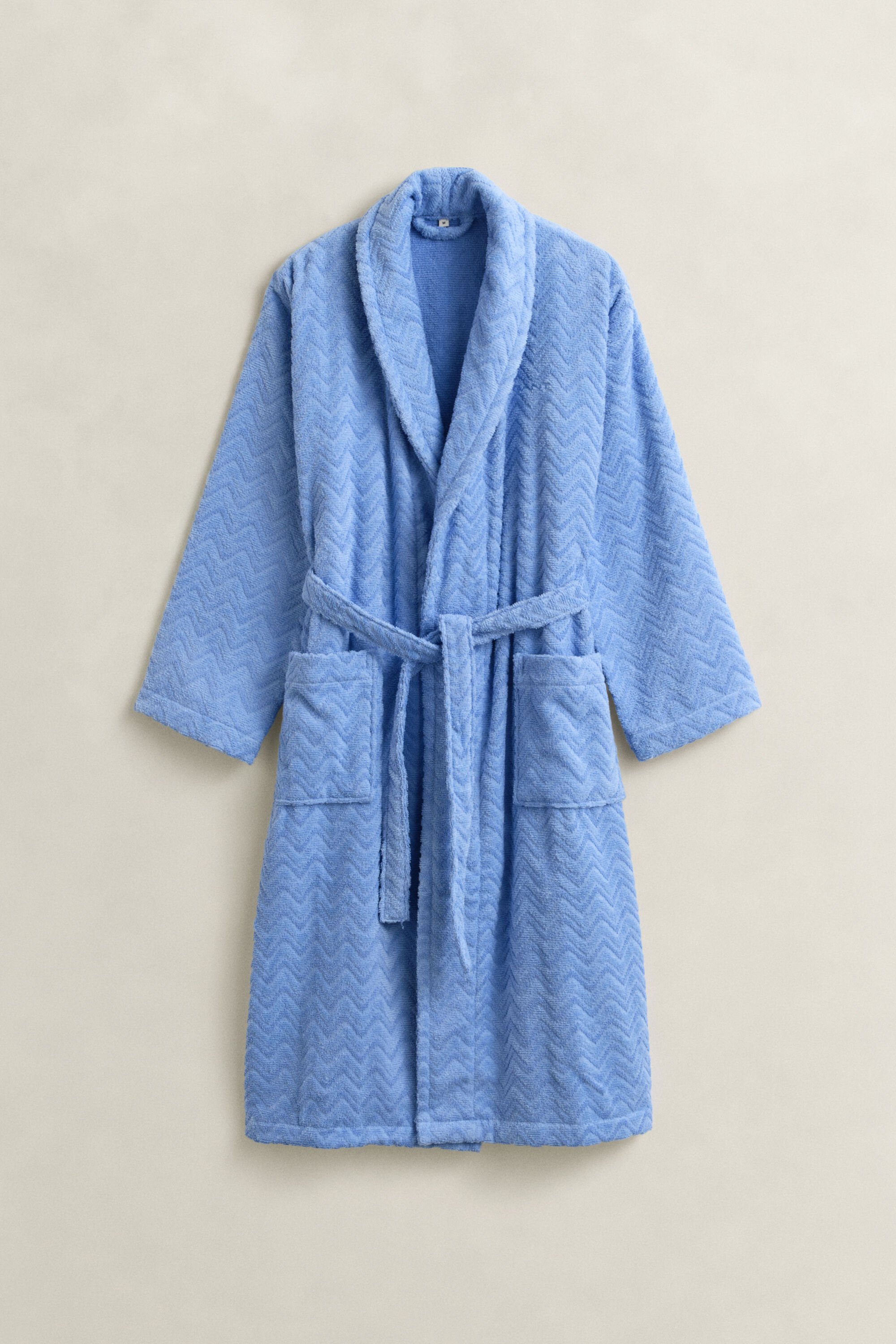 Fiskbensmönstrad badrock i jacquard