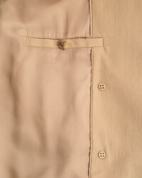 Mellanlång trenchjacka