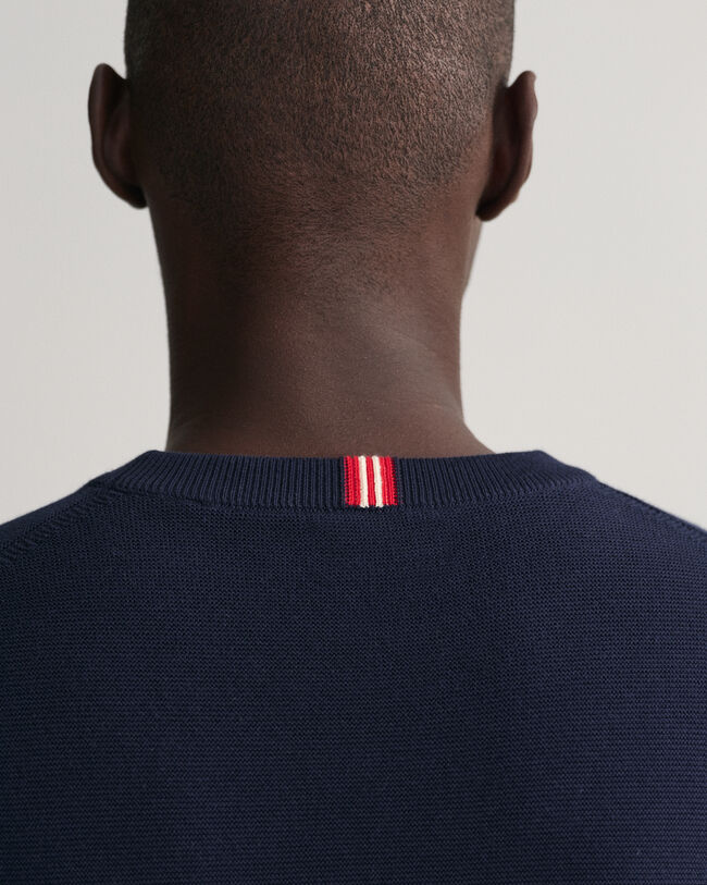 Tunnstickad crew neck tröja