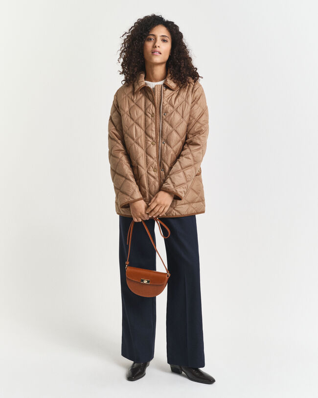 Quiltad jacka med manchesterdetaljer