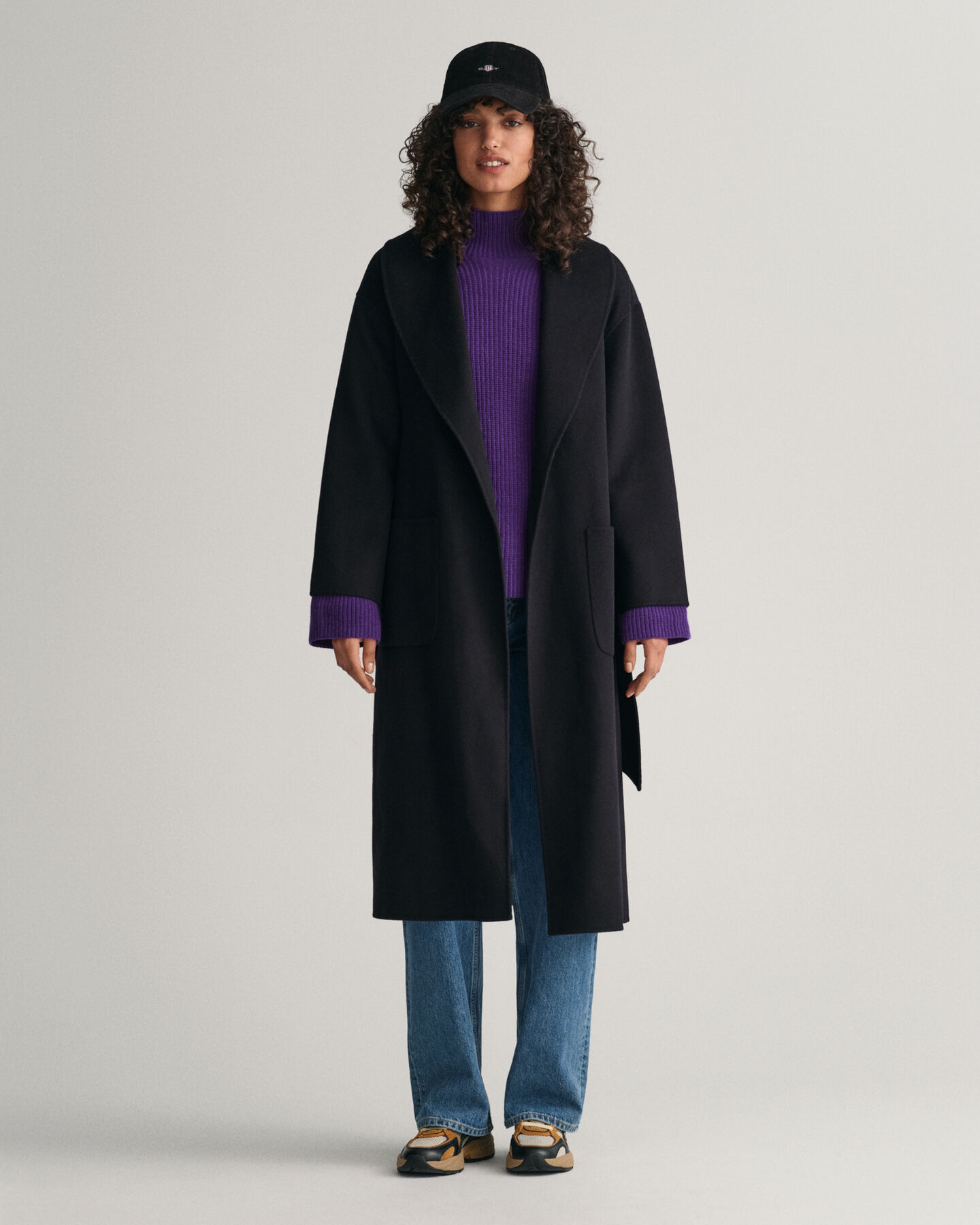 Ribbstickad ylletröja med ståkrage