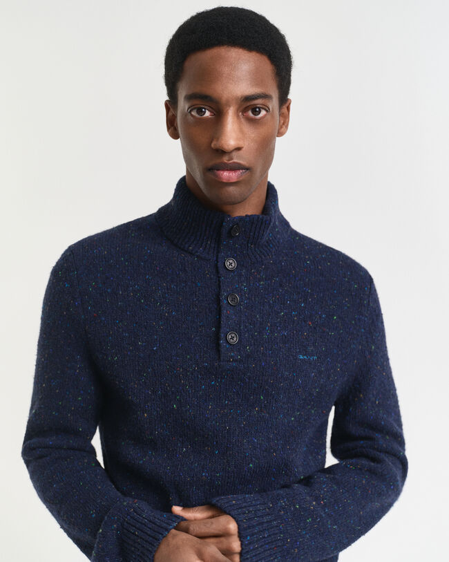 Halvknäppt tröja i ullblandning med neps