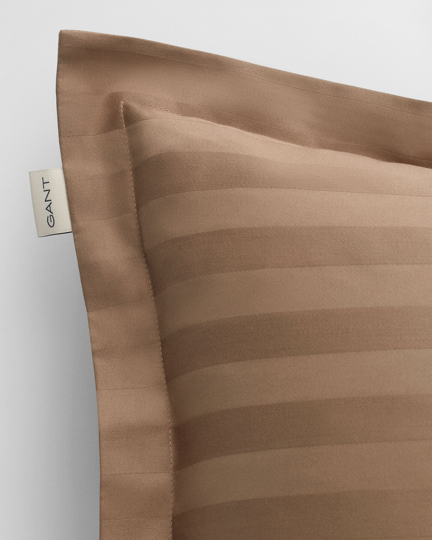 Sateen randigt örngott